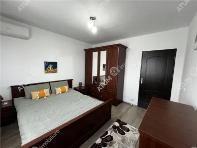 De vanzare apartament renovat cu 3 camere de 71 mp la etaj interemdiar zona Vasile Aaron din Sibiu - foto 4
