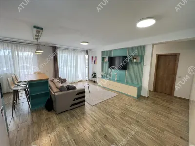De vanzare apartament cu 3 camere decomandate balcon si loc parcare situat in zona Piata Cluj din Sibiu - foto 2