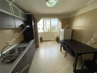 De inchiriat apartament cu 2 camere decomandate cu balcon si pivnita in zona centrala din Sibiu - foto 7