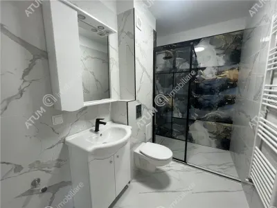 De vanzare apartament cu 4 camere si 2 bai situat in Selimbar zona Ion Ratiu - foto 9