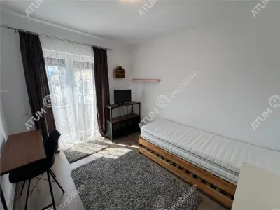 De inchiriat apartament cu 2 camere balcon si loc parcare situat in zona Calea Cisnadiei din Sibiu - foto 3