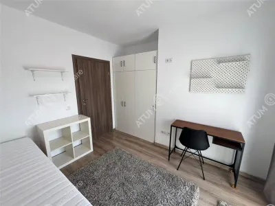 De inchiriat apartament cu 2 camere balcon si loc parcare situat in zona Calea Cisnadiei din Sibiu - foto 4