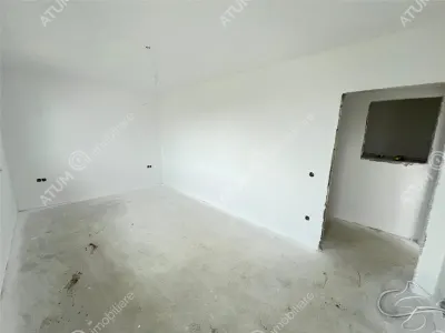 Casa de vanzare cu 3 camere 2 bai si curte libera de 170 mp situata in zona Calea Cisnadiei din Sibiu - foto 5