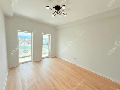 Se vinde in zona Pictor Brana apartament finisat la cheie cu 2 camere si balcon etajul 1 - foto 3