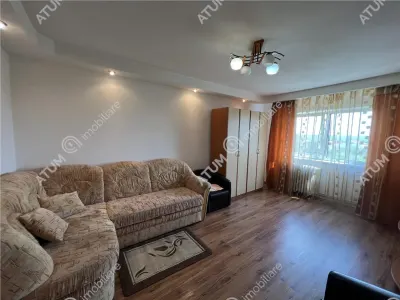 De vanzare apartament cu 2 camere decomandate cu boxa si pivnita zona Vasile Aaron din Sibiu - foto 1