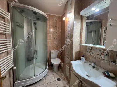 De vanzare apartament cu 2 camere decomandate cu boxa si pivnita zona Vasile Aaron din Sibiu - foto 10