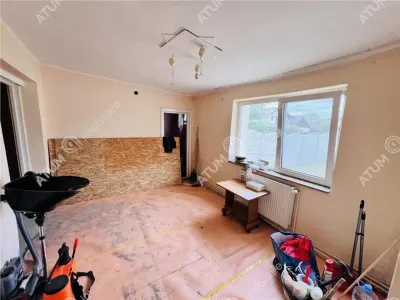Casa individuala de vanzare cu 4 camere 2 bai deschidere la 2 strazi si teren de 395 mp situata in zona Trei Stejari din Sibiu - foto 18