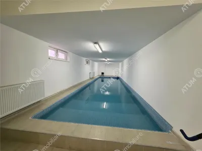 Casa individuala de vanzare cu 5 camere si piscina teren de 500 mp in zona Turnisor din Sibiu - foto 21