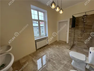 De inchiriat spatiu de birouri complet renovat cu 3 camere si 2 bai zona centrala din Sibiu - foto 11