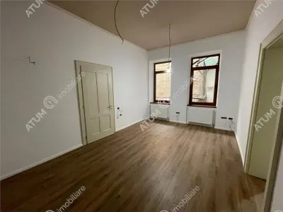 De vanzare apartament cu 3 camere la etajul 1 situat pe strada Nicolae Balcescu din Sibiu - foto 2