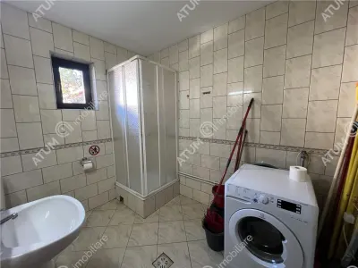 De vanzare pensiune de 7 camere cu 5 bai si teren de 377mp  situata in Paltinis cota 1440 m - foto 11