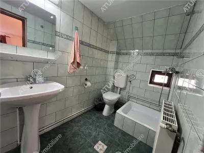 De vanzare pensiune de 7 camere cu 5 bai si teren de 377mp  situata in Paltinis cota 1440 m - foto 13
