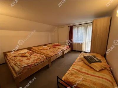 De vanzare pensiune de 7 camere cu 5 bai si teren de 377mp  situata in Paltinis cota 1440 m - foto 7