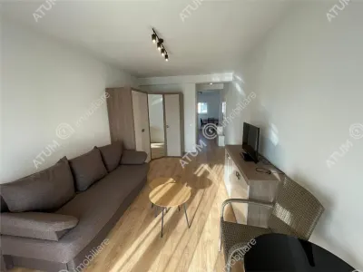 De inchiriat garsoniera la etajul 1 cu balcon si loc de parcare in cartierul Da Vinci din zona de Vest Sibiu - foto 3