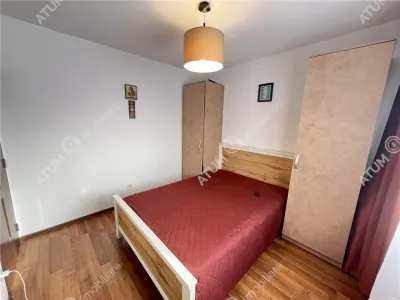 De vanzare apartament mobilat si utilat cu 3 camere 2 bai pivnita situat in zona Turnisor din Sibiu - foto 7