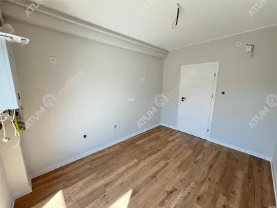 De vanzare apartament finisat la cheie cu 3 camere si balcon zona Pictor Brana Selimbar - foto 13