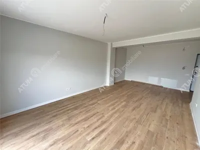 De vanzare apartament finisat la cheie cu 2 camere balcon etajul 2 zona Pictor Brana din Selimbar - foto 2
