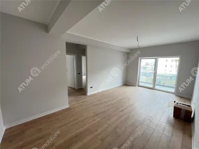 De vanzare apartament la cheie cu 3 camere decomandate 2 bai 2 balcoane si loc parcare in zona Pictor Brana Selimbar - foto 2