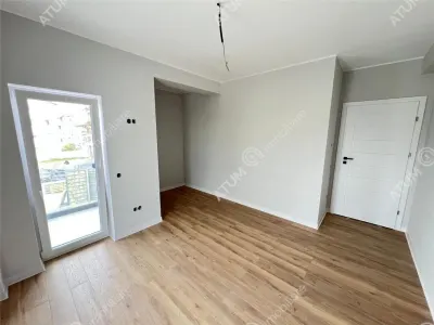 De vanzare apartament la cheie cu 3 camere decomandate 2 bai 2 balcoane si loc parcare in zona Pictor Brana Selimbar - foto 3