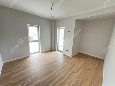 De vanzare apartament la cheie cu 3 camere decomandate 2 bai 2 balcoane si loc parcare in zona Pictor Brana Selimbar - foto 4