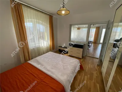 De inchiriat casa cu 8 camere si curte de 800 mp in zona Calea Poplacii din Sibiu - foto 12