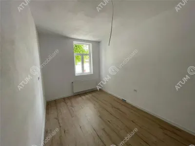 De vanzare apartament cu 2 camere pivnita si curte comuna in zona Piata Cluj din Sibiu - foto 2