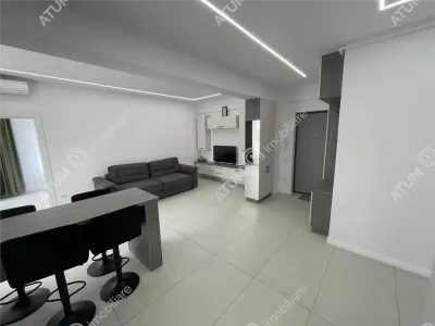 De inchiriat apartament tip penthouse cu 2 camere terasa si loc de parcare in zona Calea Surii Mici din Sibiu - foto 3