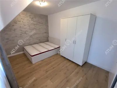 De inchiriat casa ultramoderna cu 4 camere 3 bai si dressing 170 mp utili in Sibiu - foto 5