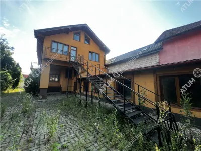 De inchiriat spatiu comercial/casa individuala cu 10 camere si teren de 600 mp in zona Piata Cluj din Sibiu - foto 5