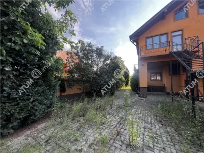 De inchiriat spatiu comercial/casa individuala cu 10 camere si teren de 600 mp in zona Piata Cluj din Sibiu - foto 7