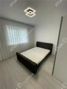 De vanzare casa cu 4 camere decomandate balcon terasa si curte libera 180 mp in zona Selimbar din Sibiu - foto 4