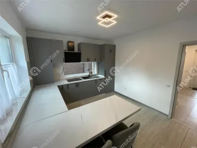 De vanzare casa cu 4 camere decomandate balcon terasa si curte libera 180 mp in zona Selimbar din Sibiu - foto 10