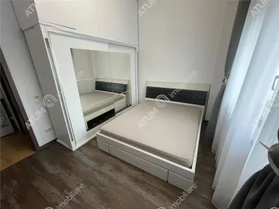 De inchiriat apartament penthouse cu 4 camere decomandate 2 balcoane terasa si loc de parcare situat in zona Doamna Stanca din Sibiu - foto 3