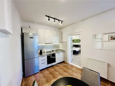 Garsoniera moderna, 44 mp utili, complet renovata, pretabil investitie - foto 12