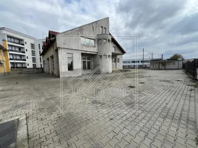 Spatiu comercial cu teren de 1500 mp, 740 mp utili - foto 2