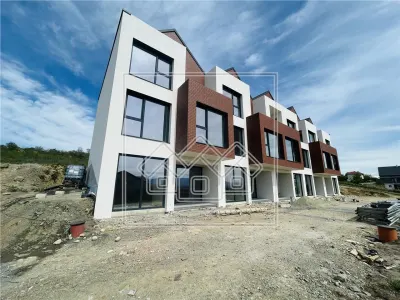 Casa cu 4 camere, 3 bai, teren de 284 mp, 2 locuri de parcare - foto 2