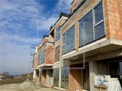 Casa cu 4 camere, 3 bai, teren de 284 mp, 2 locuri de parcare - foto 13