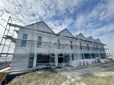 Casa cu 4 camere, 3 bai, teren de 284 mp, 2 locuri de parcare - foto 7