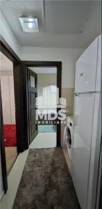 Apartament 2 dormitoare și living cu bucătărie, mobilat și utilat - foto 4