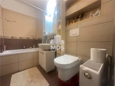 Mobilat si utilat, 77mp utili la et 3 in bloc din 2000 - foto 4
