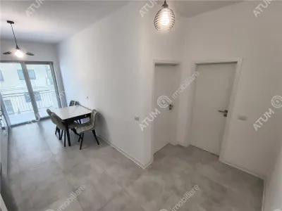 De inchiriat garsoniera moderna la etajul 1 cu boxa de depozitare si parcare proprie in zona Pictor Brana din Selimbar - foto 5
